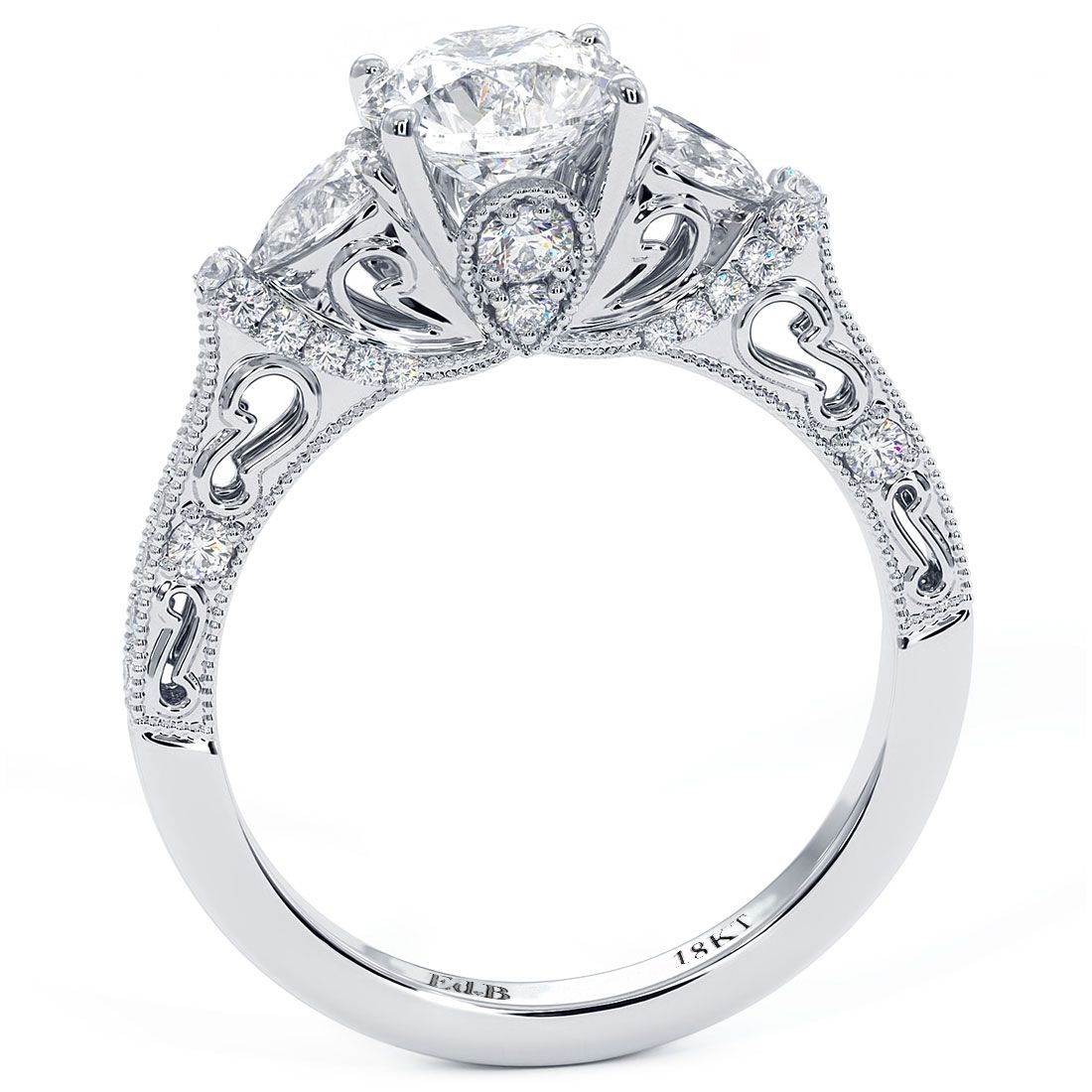 Detailed side view of three-stone engagement ring featuring pear and round diamonds with antique milgrain edges, handcrafted in 18KT white gold. Designed by Global Sky Diamonds, 44W 47th St Booth GF-10, Diamond District New York. Elegant filigree and pave diamond accents. globalskydiamond.com | @globalskydiamonds | TikTok @global.sky.diamonds | #Mazalito #EngagementRing