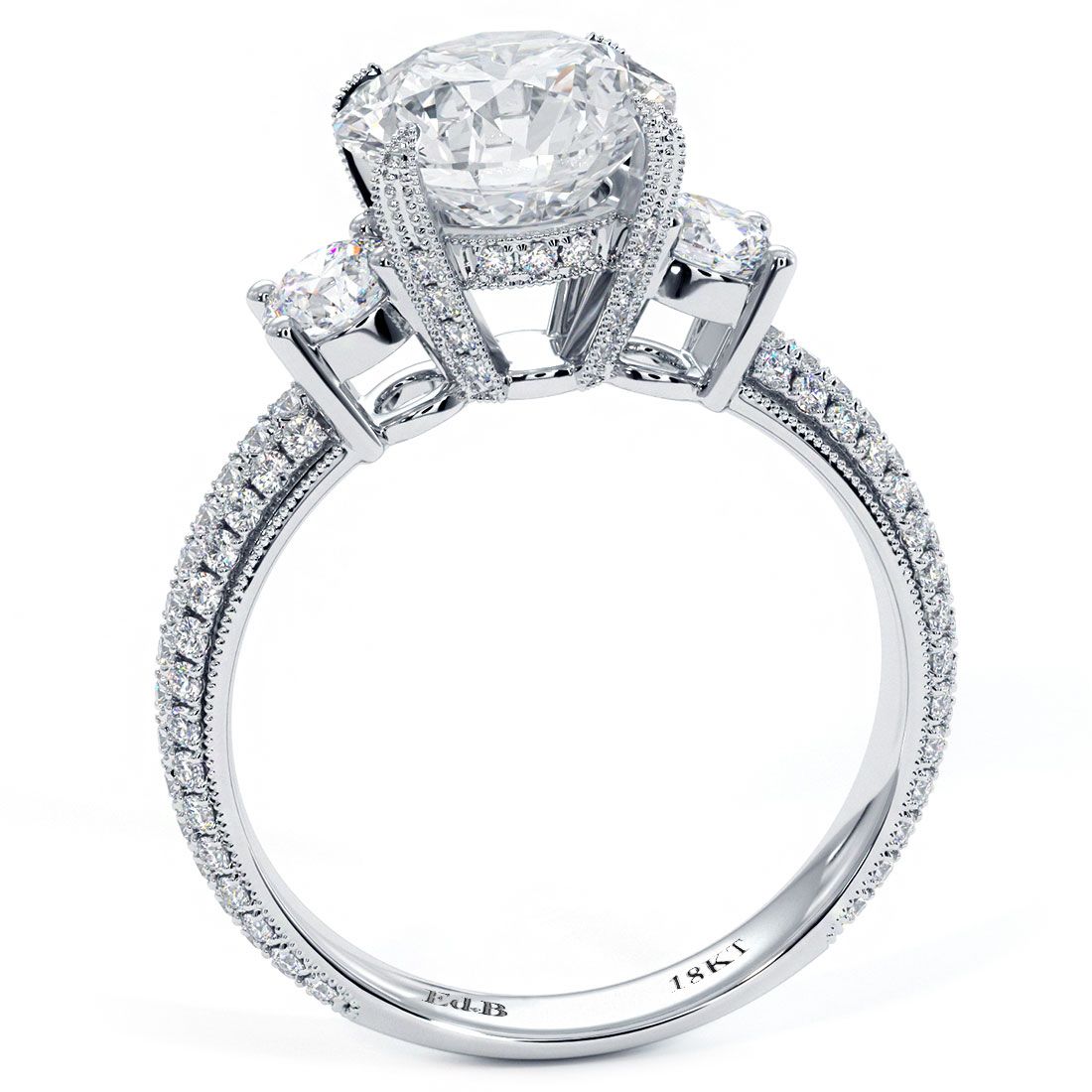 Side profile view of an 18k white gold engagement ring featuring a round center diamond and side stones in eagle prongs with delicate micropavé diamonds – GlobalSkyDiamond.com | #ThreeStoneRing #MazalitoStyle