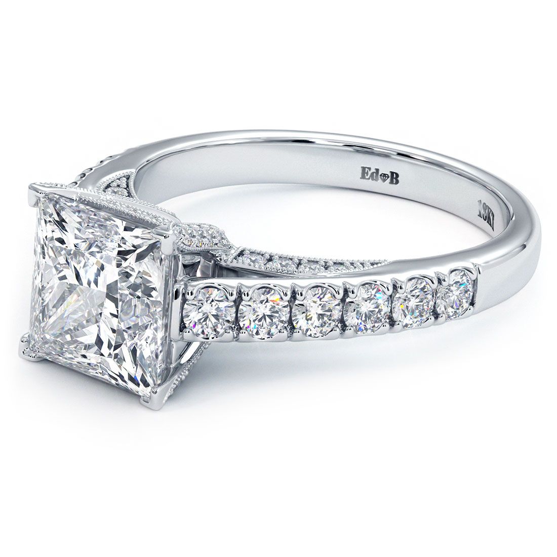 Princess cut diamond ring setting with 18k white gold micropavé band and milgrain detail, 0.80ctw SI1 G side diamonds, no center stone. Shop luxury bridal jewelry at Global Sky Diamonds NYC. globalskydiamond.com