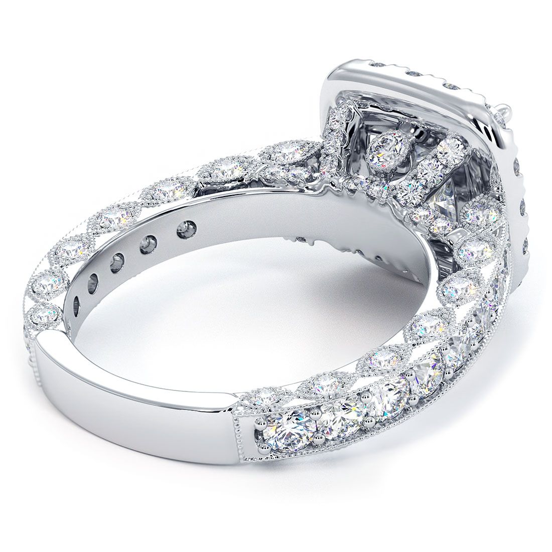 Underside view of cushion halo engagement ring with filigree scrollwork in 18K white gold. Features 1.90ctw side stones, G/SI1, with a setting crafted for a 3.0ct princess cut center. Hand-finished for heirloom quality. From Global Sky Diamonds, NYC Diamond District, 44W 47th St Booth GF-10. globalskydiamond.com @globalskydiamonds @global.sky.diamond