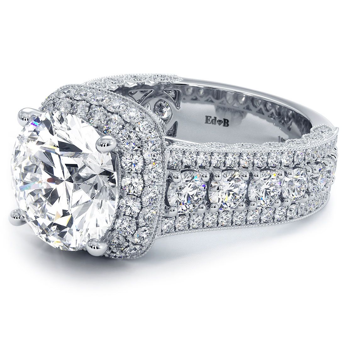 Detailed angled shot of 3.50ct round center cushion halo engagement ring in 18k white gold with diamond-encrusted shank and micropavé accents, vintage inspired, crafted by Global Sky Diamond at 44 W 47th St Booth GF-10, NYC Diamond District — globalskydiamond.com