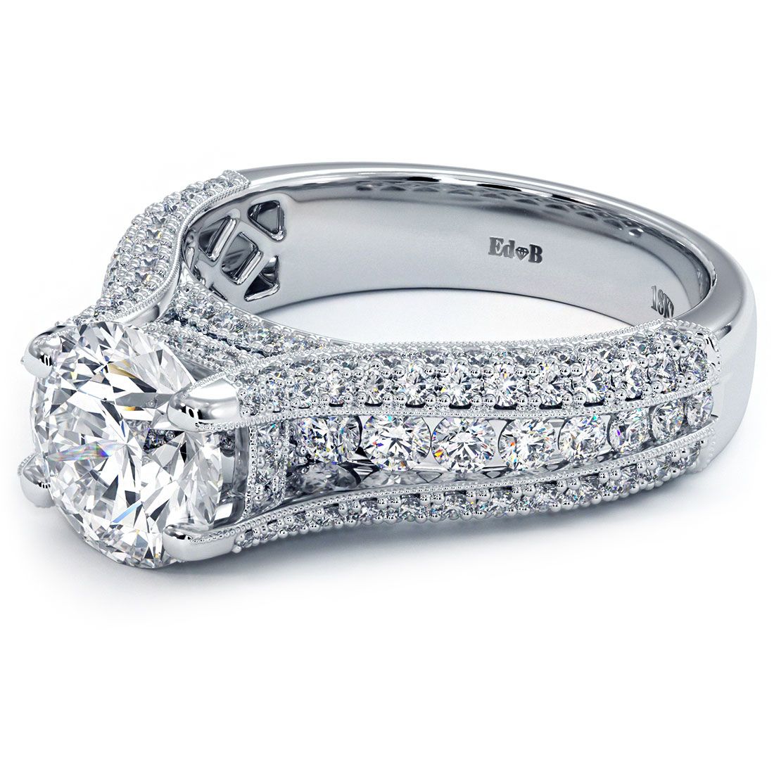 Angled view of vintage cushion halo engagement ring setting featuring round center mount and micropavé graduated shank in 18k white gold, 2.65 carats, from GlobalSkyDiamond.com – Mazalito NYC fine jewelry.