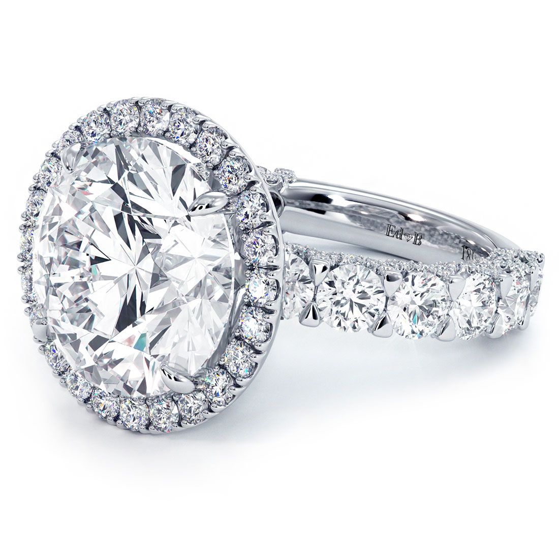 Detailed close-up angle of the round halo and U-shape shank featuring 3.45ctw micropavé G/SI1 diamonds in 18k white gold, with a secure 7.40ct round center mount (stone not included), combining high-carat elegance and brilliant craftsmanship — available only at Global Sky Diamond, 44 W 47th St Booth GF-10 in NYC’s Diamond District — shop online at globalskydiamond.com.