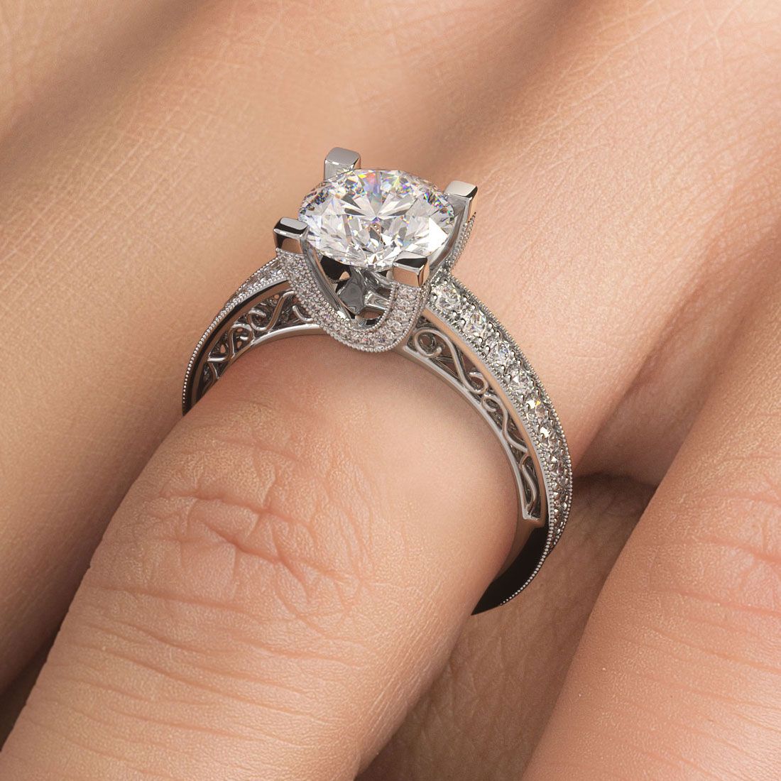 Elegant filigree round diamond engagement ring in 18k white gold on hand, U-shaped prongs and vintage pavé setting from Global Sky Diamonds, NYC Diamond District jeweler - @globalskydiamonds