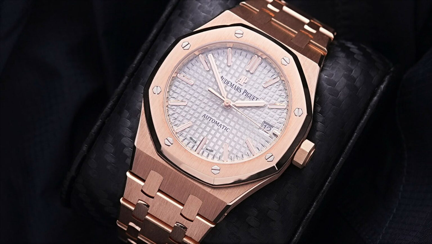 Close-up of AP Royal Oak nickel grey dial with rose gold hour markers, octagonal bezel, and date display – 15450OR luxury watch full set – globalskydiamond.com