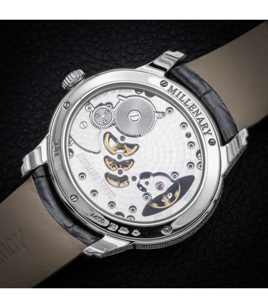 Close-up of AP Millenary Roman numeral dial with exposed balance wheel and pavé diamond bezel – elegant 39.5mm white gold ladies watch – globalskydiamond.com