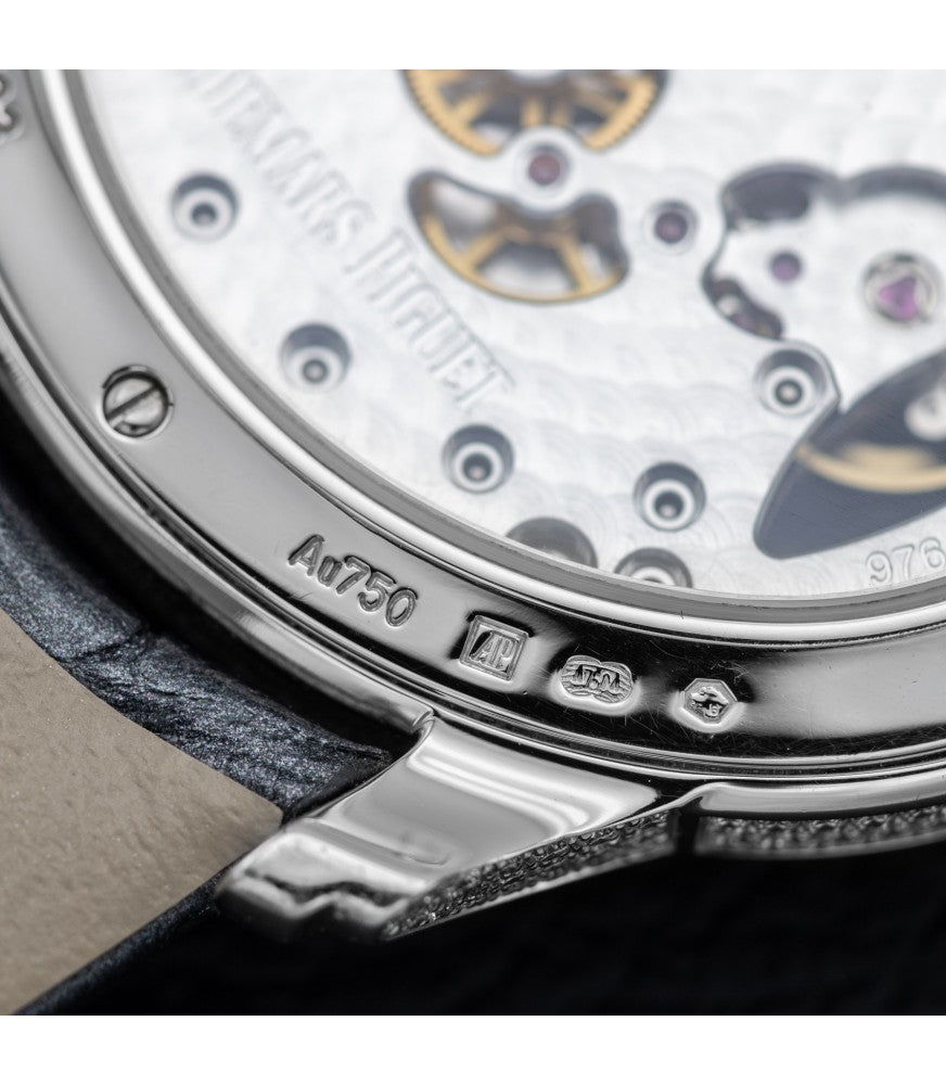 Close-up of AP Millenary Roman numeral dial with exposed balance wheel and pavé diamond bezel – elegant 39.5mm white gold ladies watch – globalskydiamond.com