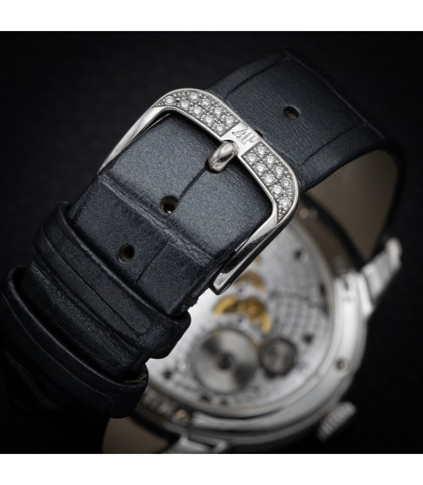 Close-up of AP Millenary Roman numeral dial with exposed balance wheel and pavé diamond bezel – elegant 39.5mm white gold ladies watch – globalskydiamond.com