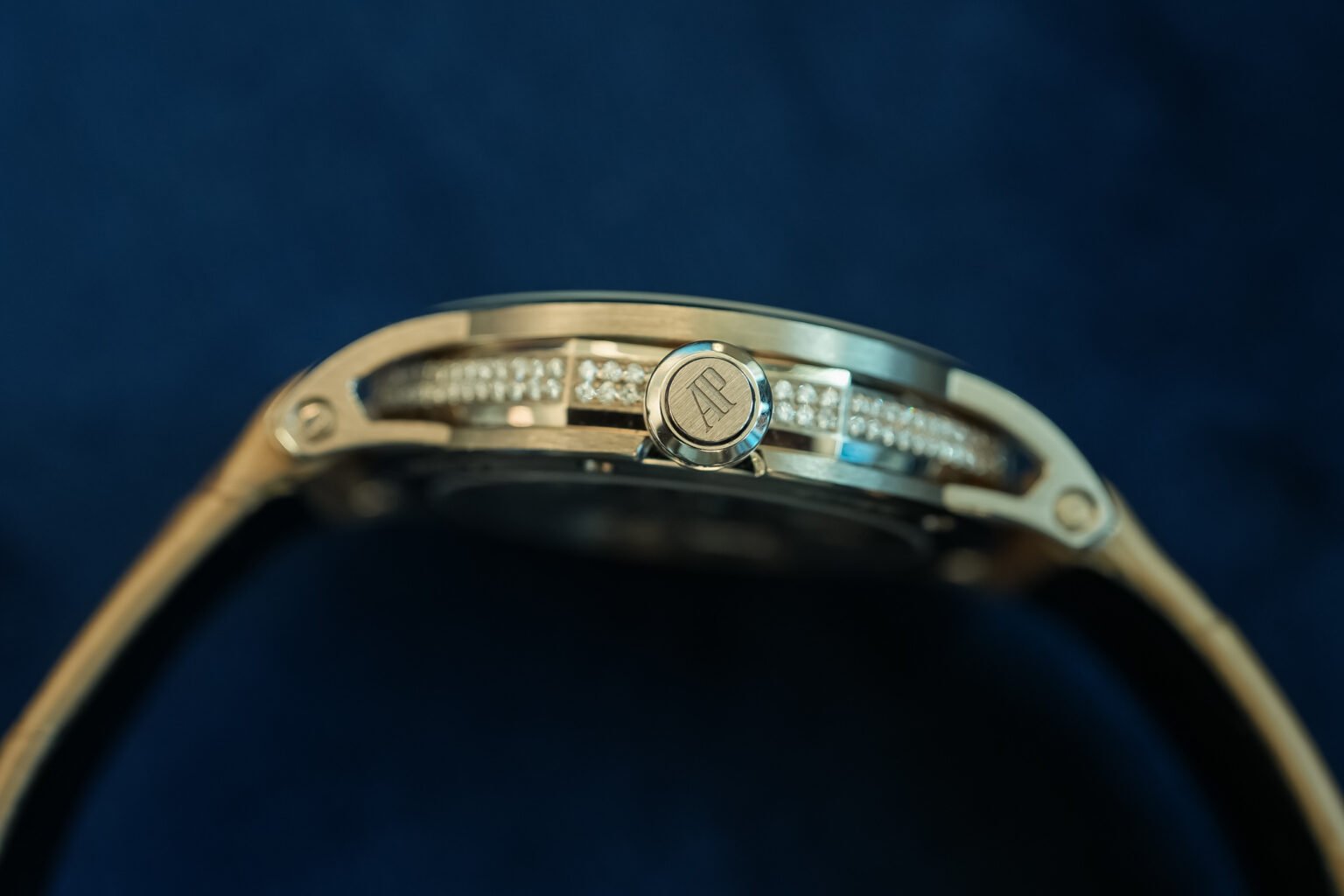Side view of Audemars Piguet Code 11.59 with sculpted sand gold mid-case and diamond-set lugs – 38mm automatic model ref. 26665SG – globalskydiamond.com