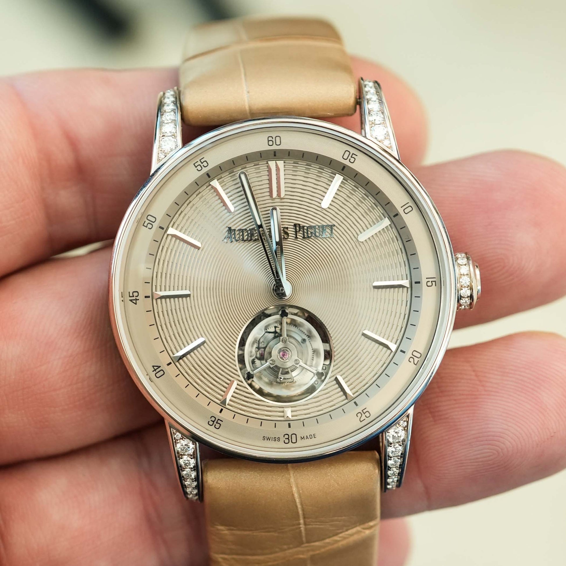 Close-up of Code 11.59 sand gold-toned dial with polished hands and applied markers under curved sapphire crystal – luxury AP women’s watch full set – globalskydiamond.com