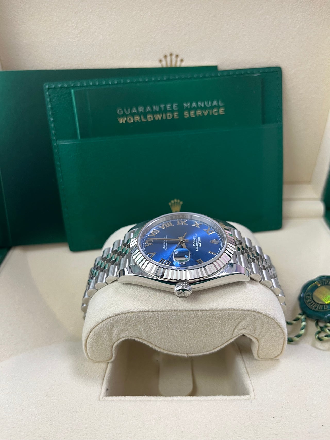 Side profile of Rolex Datejust 126334 with blue Roman dial, stainless steel case, and fluted bezel – pre-owned 2025 model in pristine condition from Global Sky Diamonds – Jubilee bracelet and Oyster clasp – globalskydiamond.com