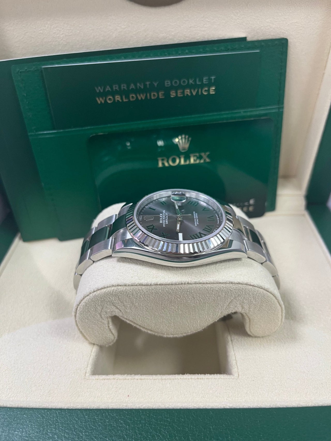 Side profile of Rolex Datejust 126334 featuring Oyster bracelet, slate grey dial, and fluted bezel – pre-owned Rolex 41mm model in excellent condition from Global Sky Diamonds – globalskydiamond.com