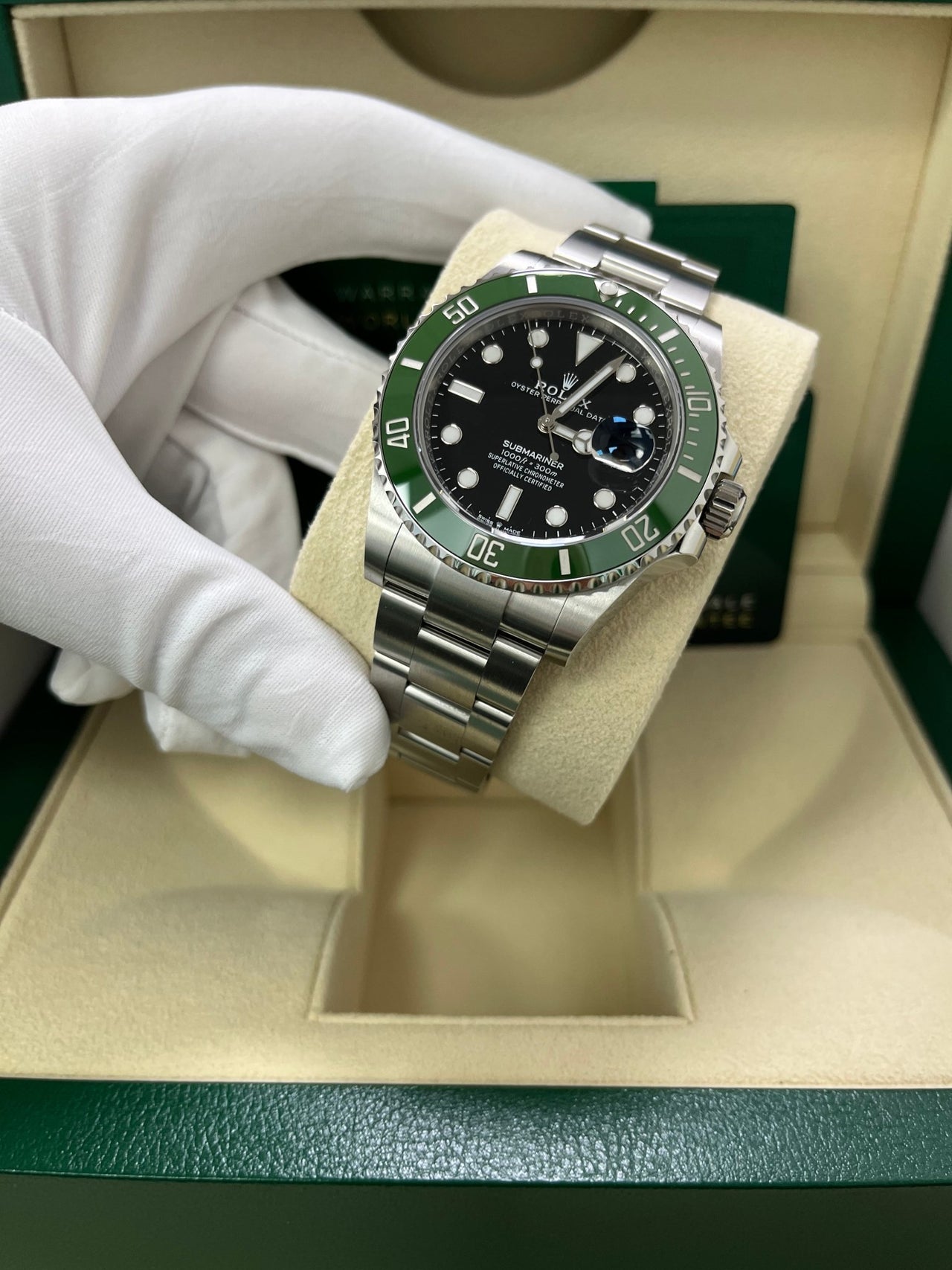 Side angle of Rolex Submariner 126610LV showing 41mm stainless steel case, Triplock crown, and Oyster bracelet – pre-owned full set Rolex available at Global Sky Diamonds – globalskydiamond.com