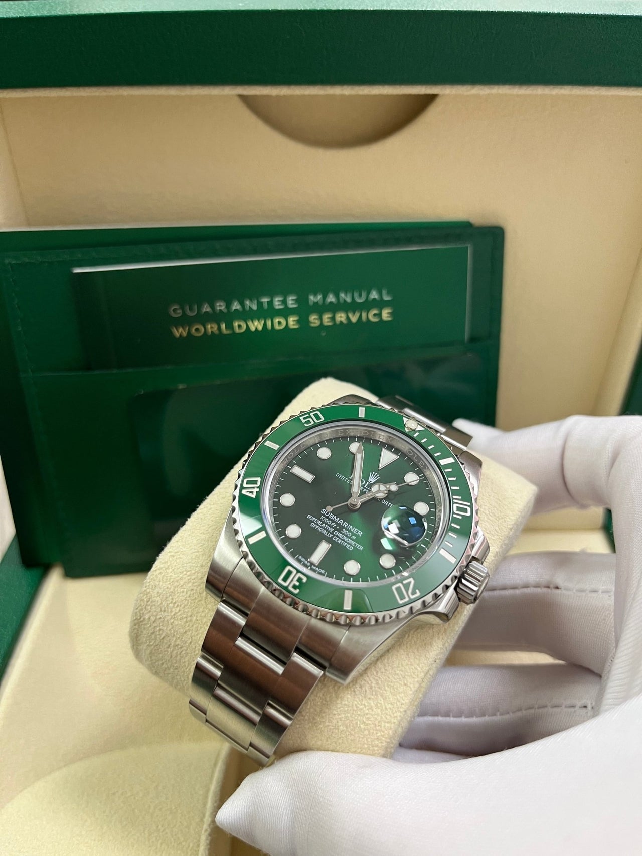 Angled shot of Rolex Submariner 40mm Hulk model 116610LV with stainless steel case, Glidelock clasp, and green dial – pre-owned 2018 full set for $18,500 at Global Sky Diamonds – globalskydiamond.com