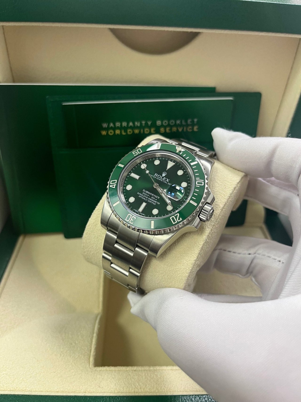 Angled shot of Rolex Submariner 40mm Hulk model 116610LV with stainless steel case, Glidelock clasp, and green dial – pre-owned 2018 full set for $18,500 at Global Sky Diamonds – globalskydiamond.com