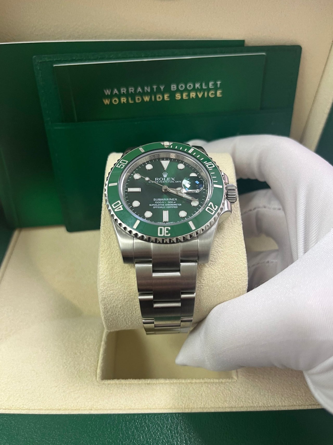 Close-up of Rolex Submariner Hulk green dial and bezel with Chromalight lume and Cyclops date – 116610LV in like-new 2018 condition with box and papers – globalskydiamond.com
