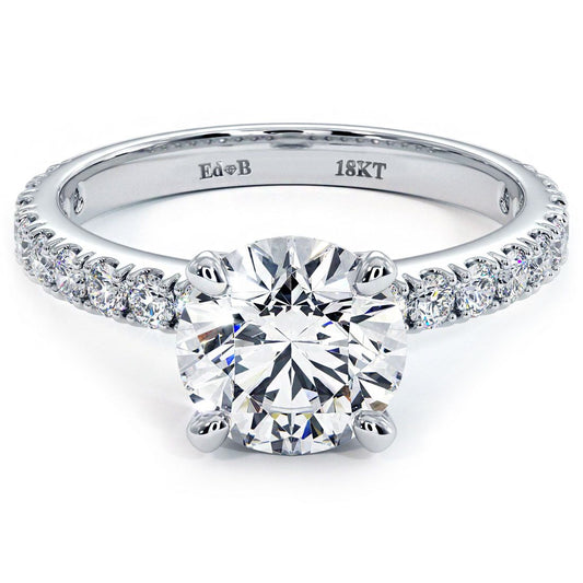 Round brilliant diamond engagement ring with micro prong set band in 18k white gold, designer EdB, showcased on globalskydiamond.com