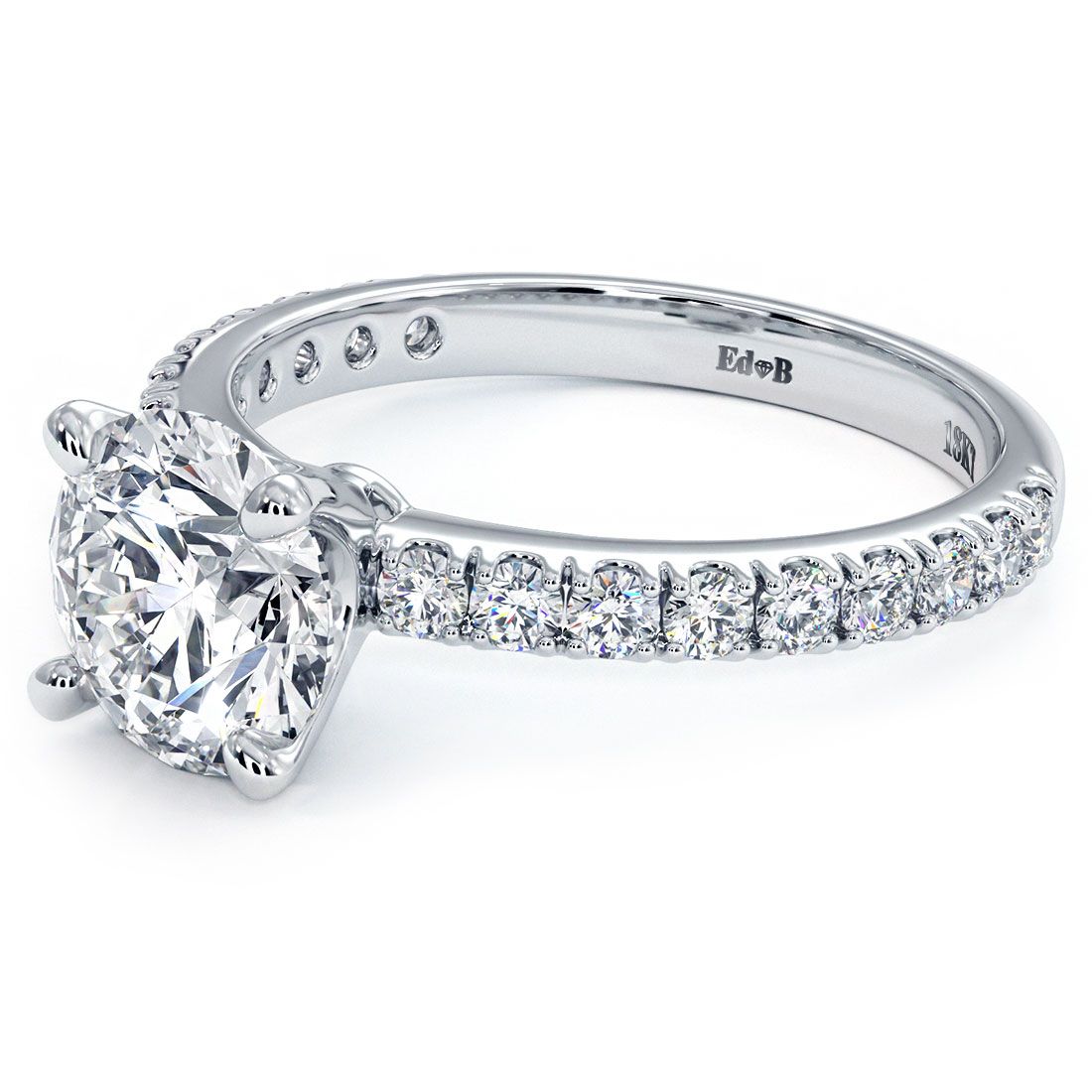 Close-up of round brilliant diamond engagement ring with pavé diamond shank in 18k white gold, from Global Sky Diamonds