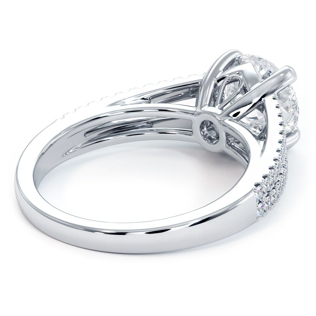 Rear view of Round Brilliant Micro-Prong Split Shank Engagement Ring Setting in 18k white gold, made to hold a 1.50ct round center diamond. 0.31ctw of G color SI1 clarity round diamonds sparkle in a delicate micro-prong split shank. Designed by Global Sky Diamonds, located in New York’s Diamond District at 44W 47th St Booth GF-10. Discover designer bridal settings at globalskydiamond.com.