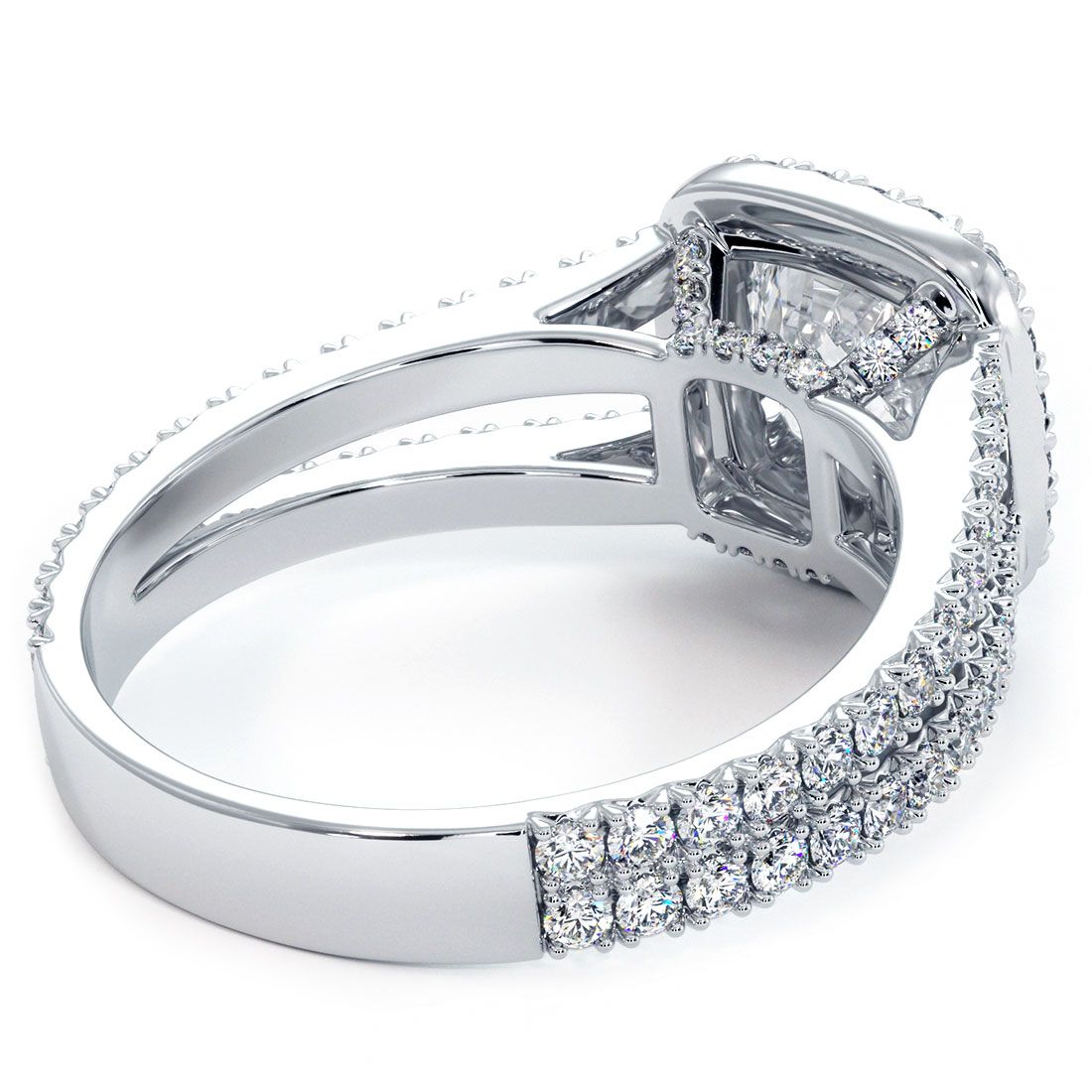 Detailed macro of cushion halo and French cut diamond split shank on 18k white gold engagement ring setting by Global Sky Diamonds. Holds 1.50ct round center (not included), with 0.98ctw G SI1 side diamonds. Visit us in the NYC Diamond District at 44W 47th St booth GF-10. globalskydiamond.com @globalskydiamonds TikTok @global.sky.diamond.