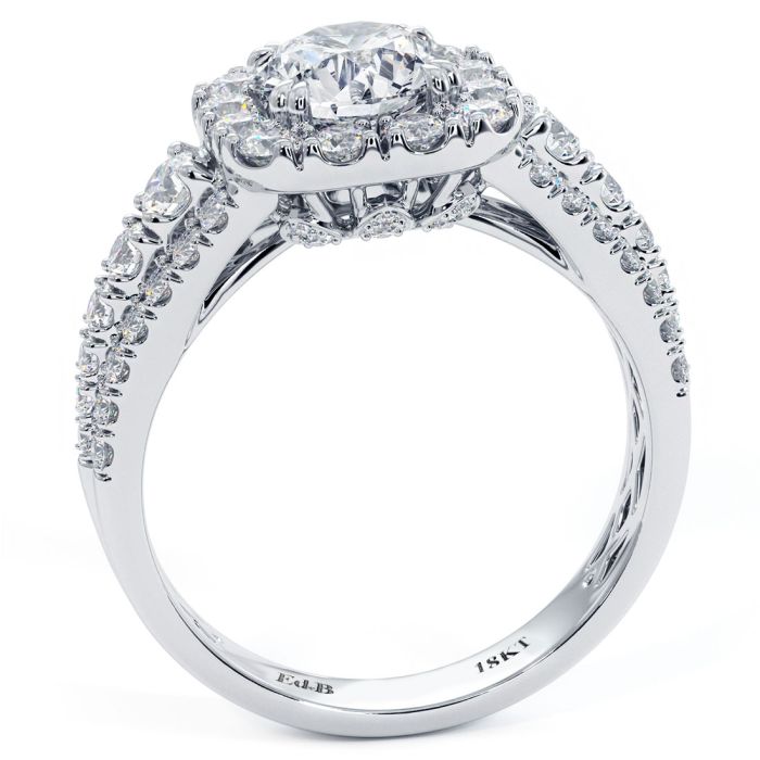Detailed shot of vintage-style cushion halo ring setting for 3.50ct round diamond center, handcrafted in 18k white gold with 2.65ctw G SI1 diamonds – Shop this Mazalito-approved design at GlobalSkyDiamond.com