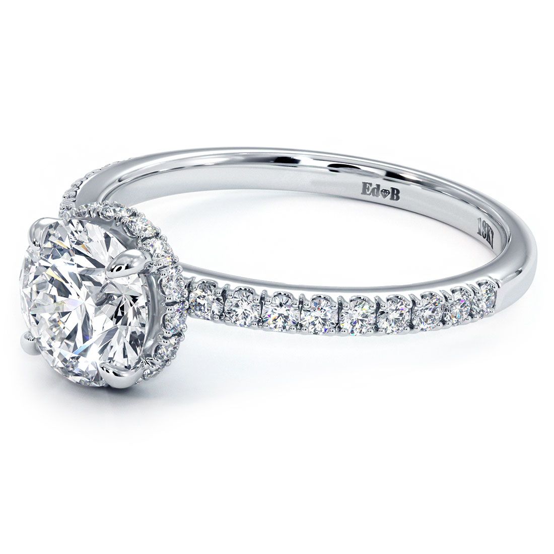 Detailed profile of round center diamond hidden halo setting with micropavé shank in white gold from Global Sky Diamonds, 44 W 47th St, NYC – globalskydiamond.com