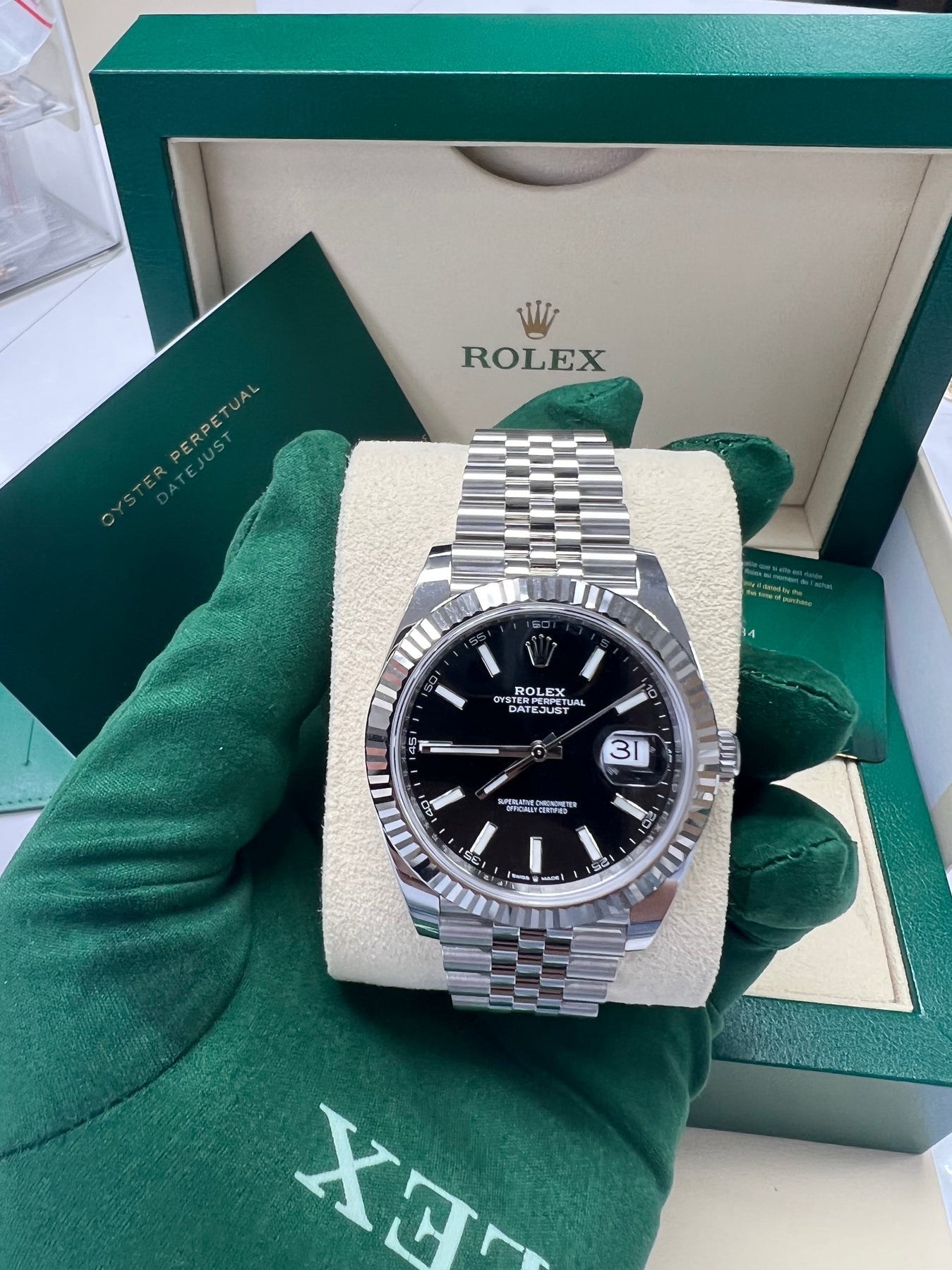 High-resolution image of Rolex Datejust 126334 in excellent pre-owned condition – 41mm stainless steel, fluted bezel, black dial, Jubilee bracelet – full set Rolex 2025 available now at globalskydiamond.com – Diamond District NYC