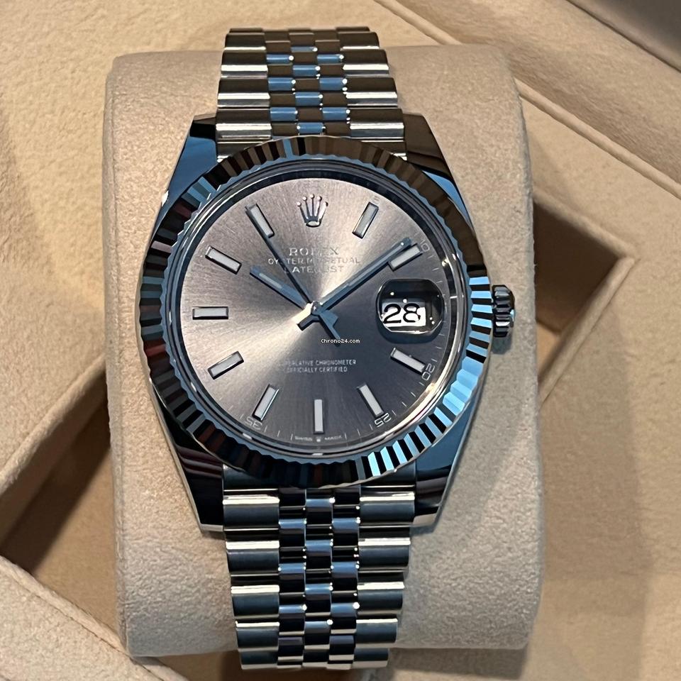 Close-up of Rolex Datejust 41mm slate dial with luminous hour markers and fluted bezel – pre-owned like-new Rolex model 126334 with 31-jewel automatic movement – globalskydiamond.com – Diamond District NYC