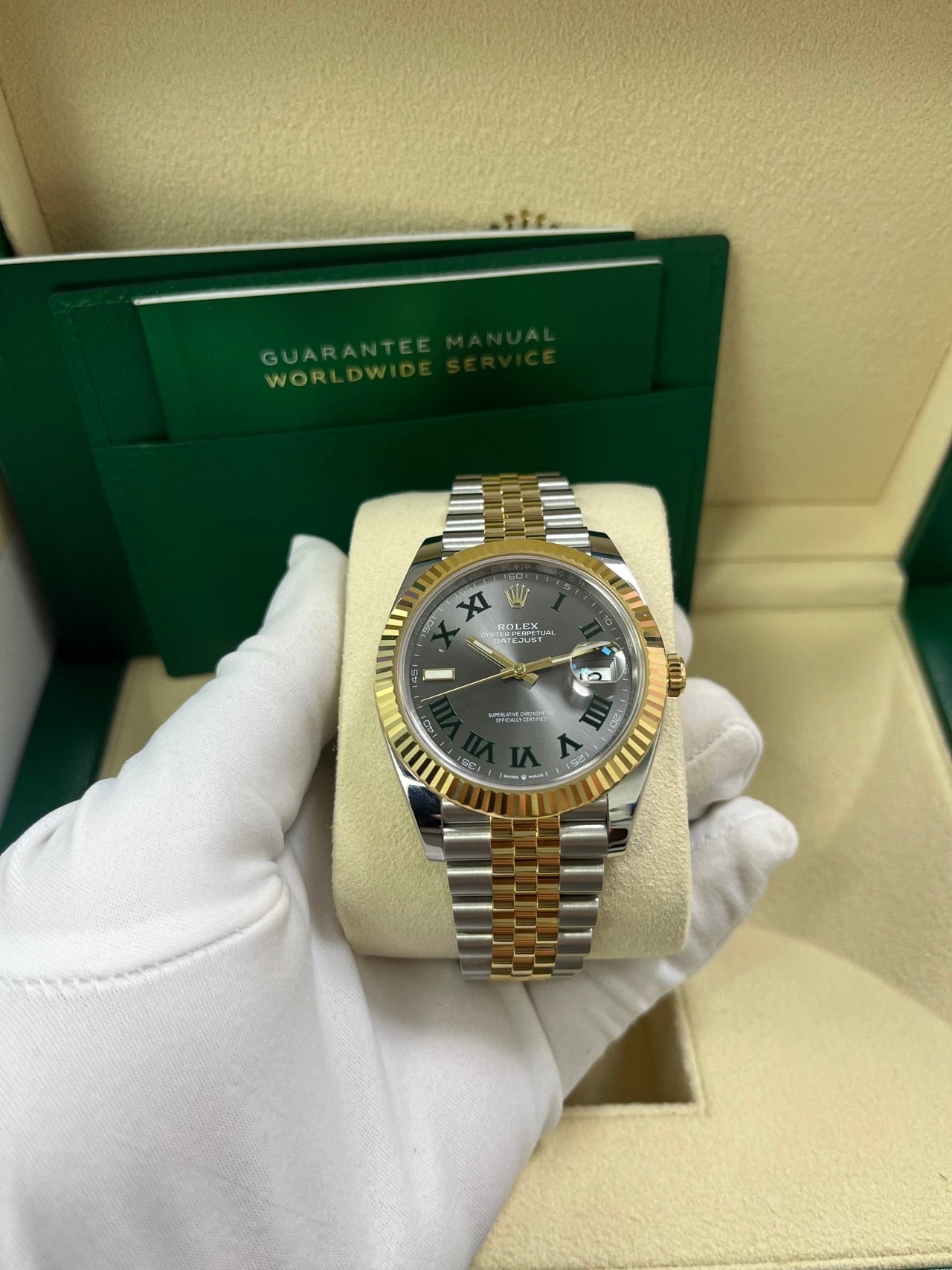 Front view of pre-owned Rolex Datejust 41mm model 126333 with grey stick dial, fluted 18k yellow gold bezel, and two-tone Jubilee bracelet – like-new 2025 Rolex full set available at Global Sky Diamonds – globalskydiamond.com