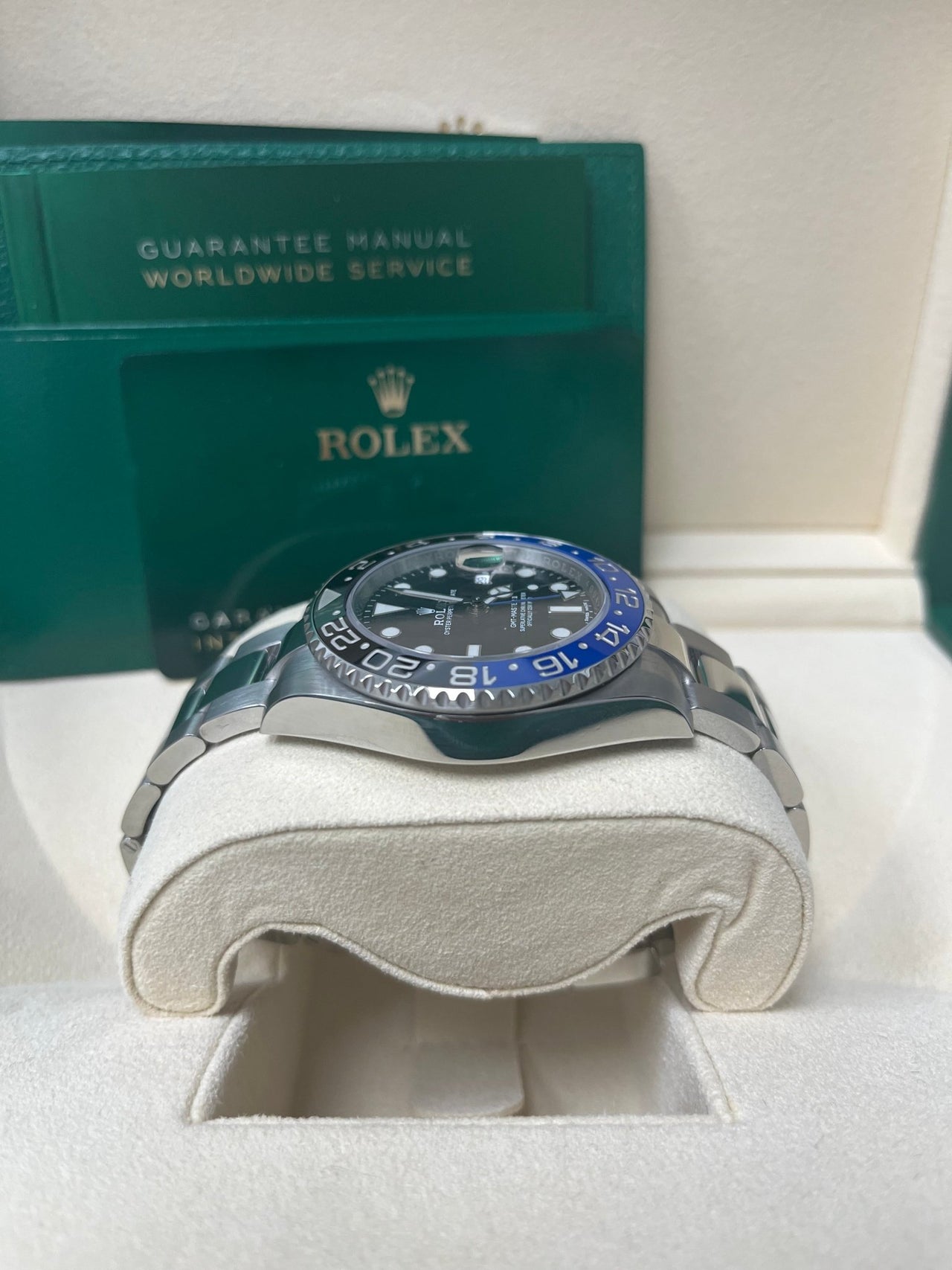 Side angle of Rolex GMT-Master II “Batman” with 40mm stainless steel case, blue-black Cerachrom bezel, and Oyster bracelet – pre-owned full set at Global Sky Diamonds – globalskydiamond.com