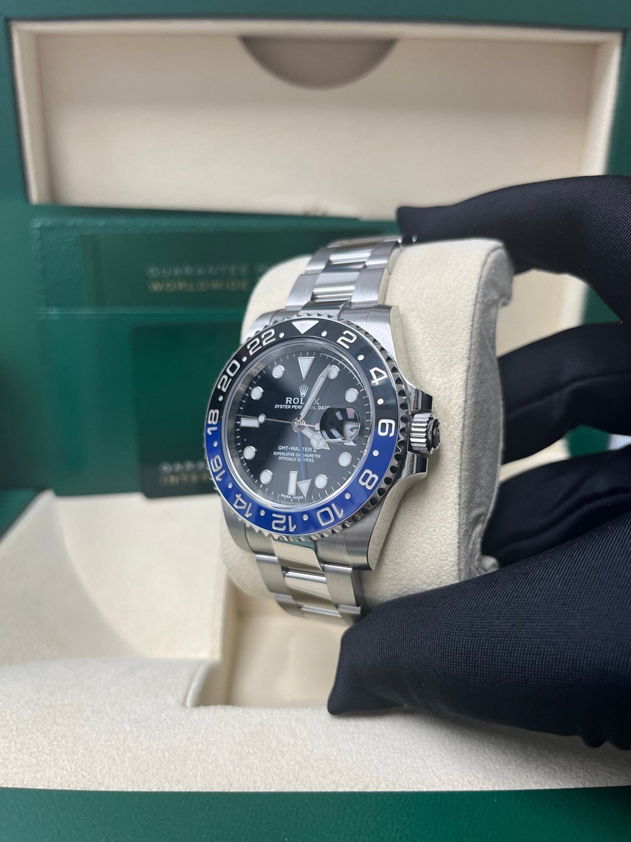 Angled product photo of Rolex GMT-Master II 116710BLNR Batman with black dial and two-tone bezel – 2018 pre-owned Rolex with box and appraisal available for $13,500 – globalskydiamond.com