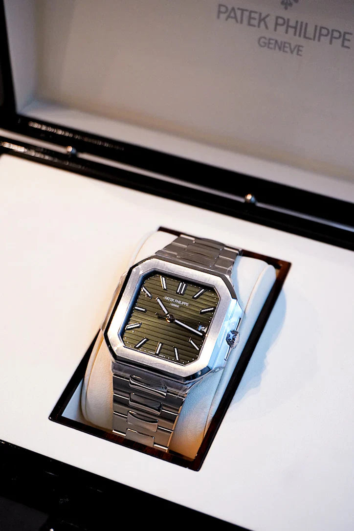 Side view of Patek Philippe Cubitus 5821/1A olive green dial watch in stainless steel, luxury timepiece photographed in NYC Diamond District – Global Sky Diamonds | GlobalSkyDiamond.com