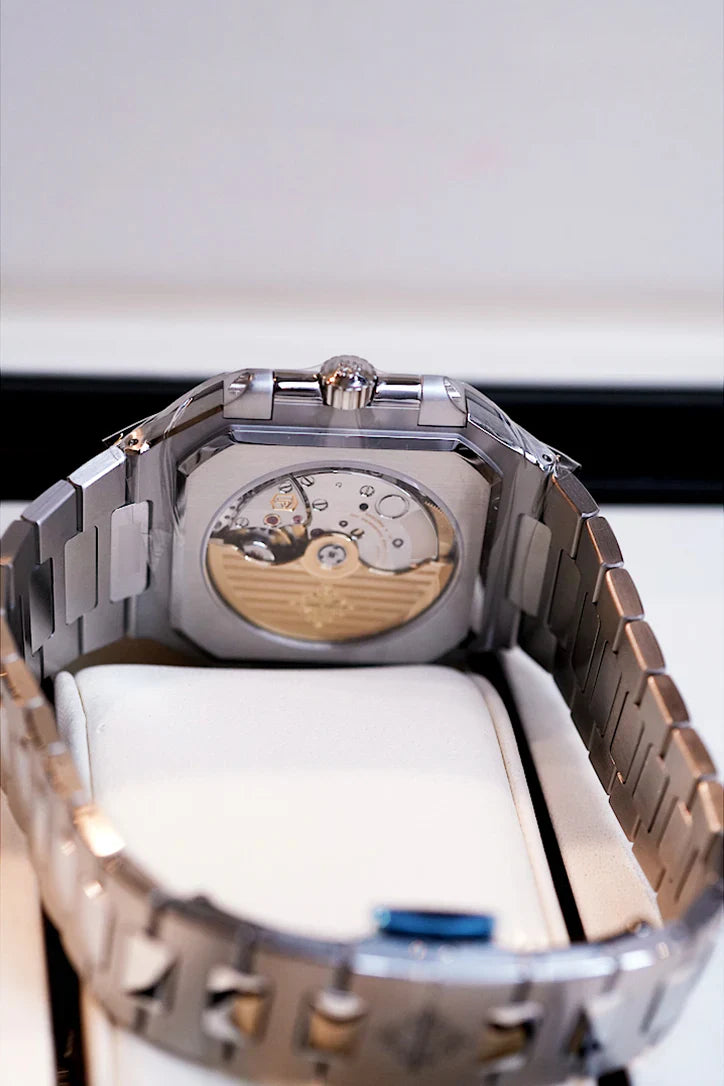 Angled close-up of Patek Philippe Cubitus 5821/1A olive green stainless steel watch bezel and dial – Shop luxury watches at Global Sky Diamonds | GlobalSkyDiamond.com